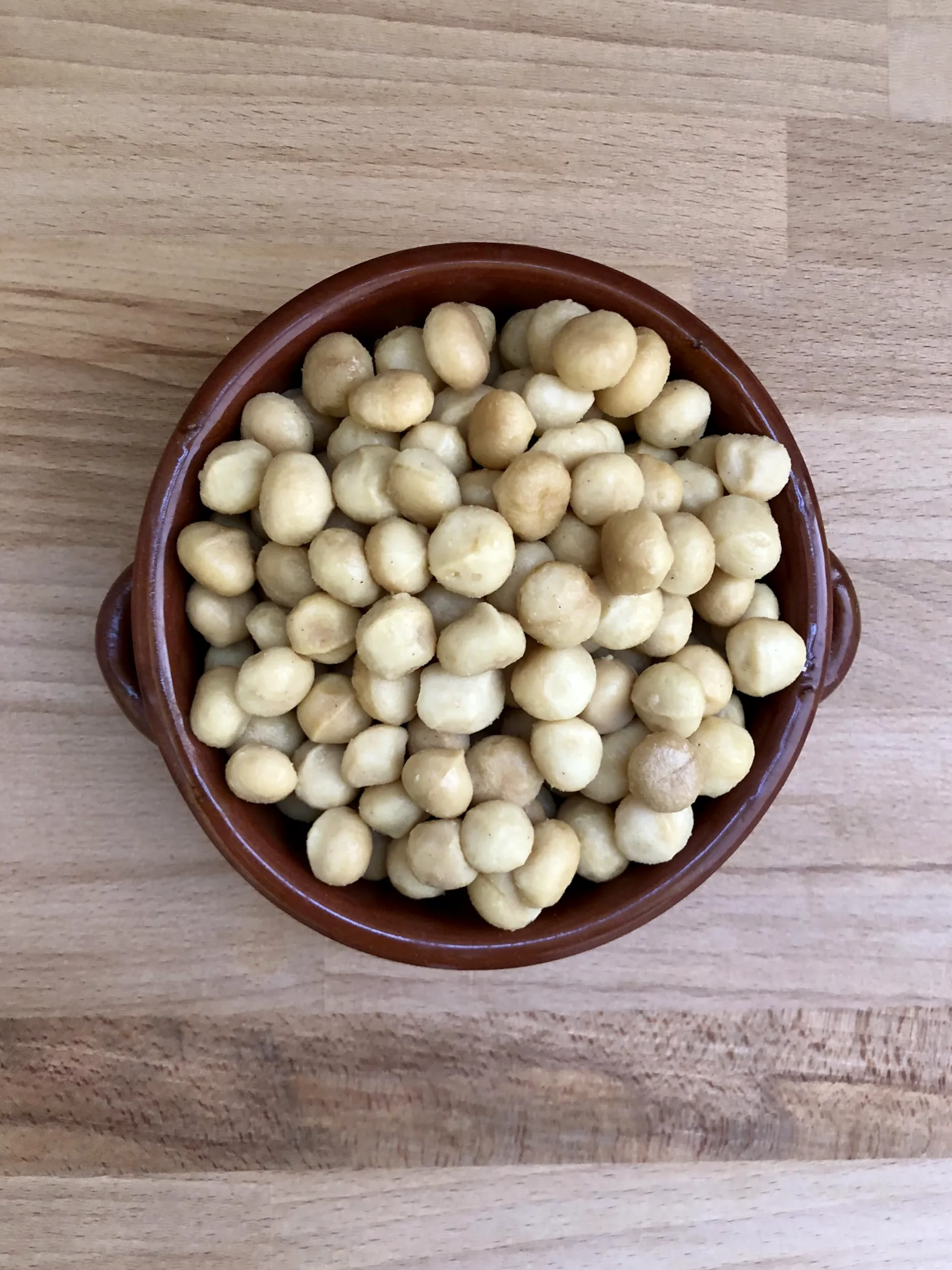 Noci Macadamia del Kenya Sgusciate - Calibrate - 100% NATURALI Senza Conservanti, Senza Sale e non Tostate - Confezione da 1 Kg in Sacchetto di Kraft Richiudibile
